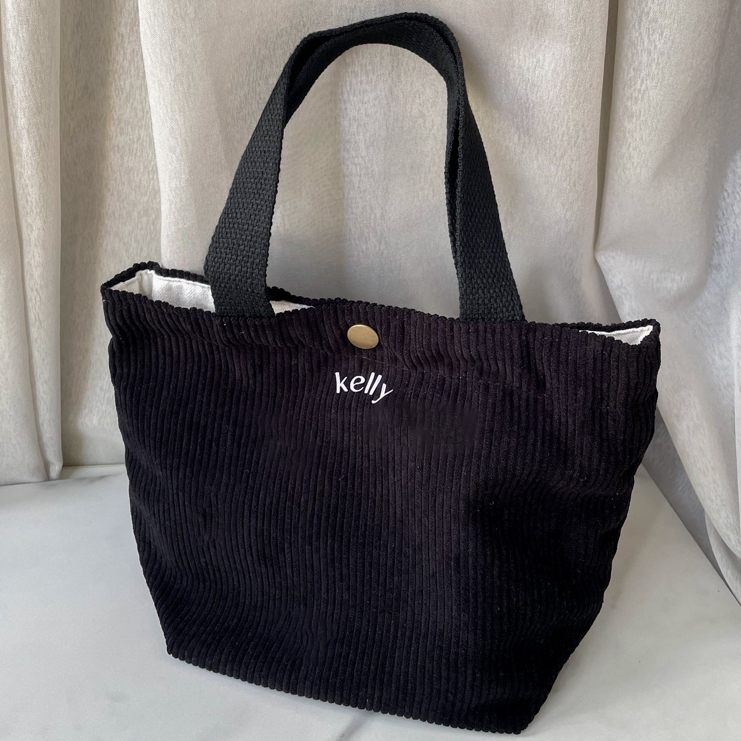 black corduroy tote bag