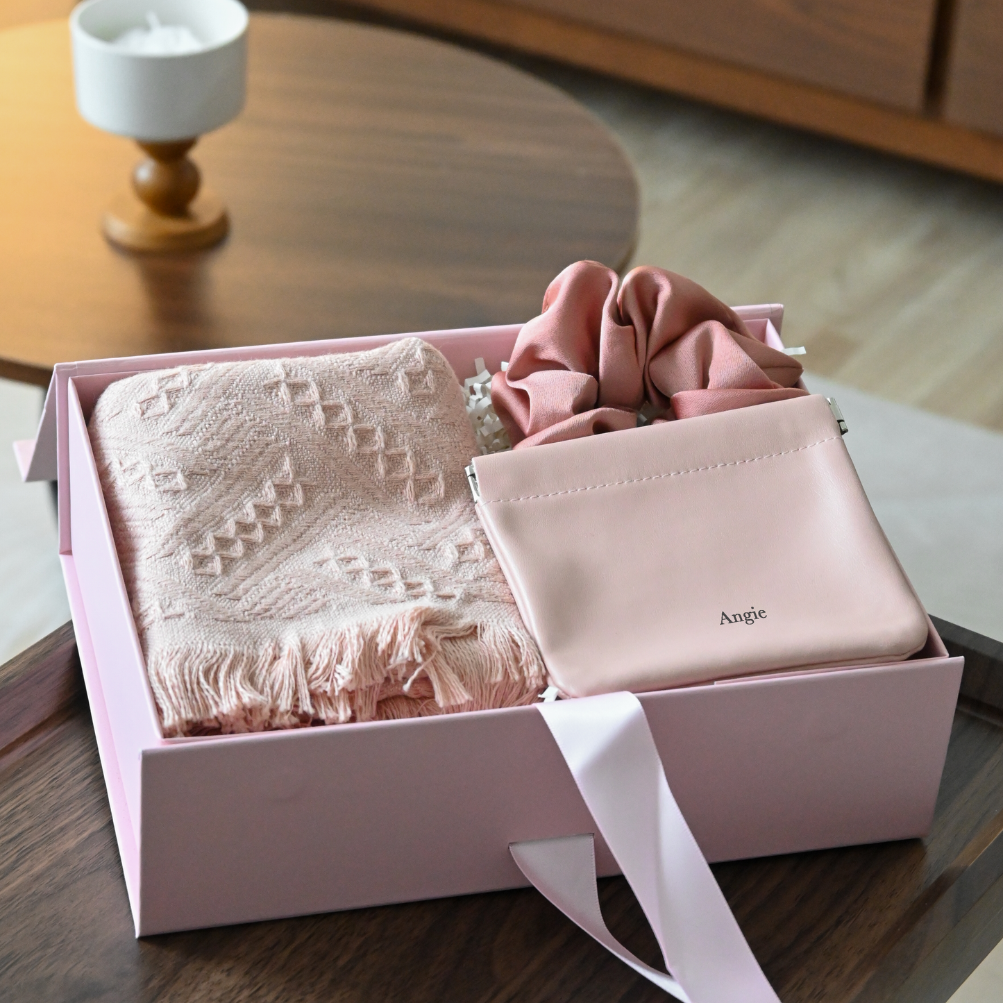 Pink gift box with pink tea towel, pink scrunchie and a personalised compact pouch