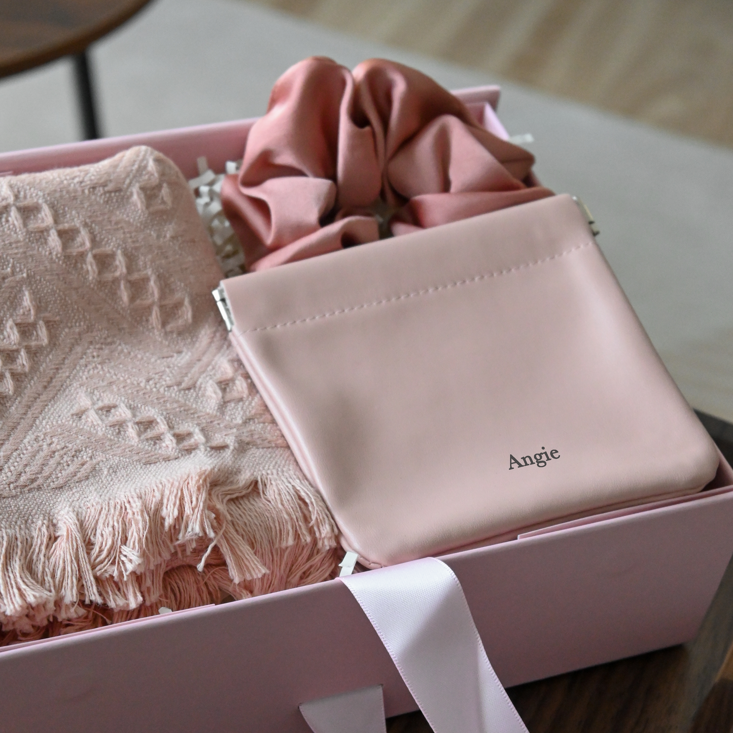 Pink gift box with pink tea towel, pink scrunchie and a personalised compact pouch