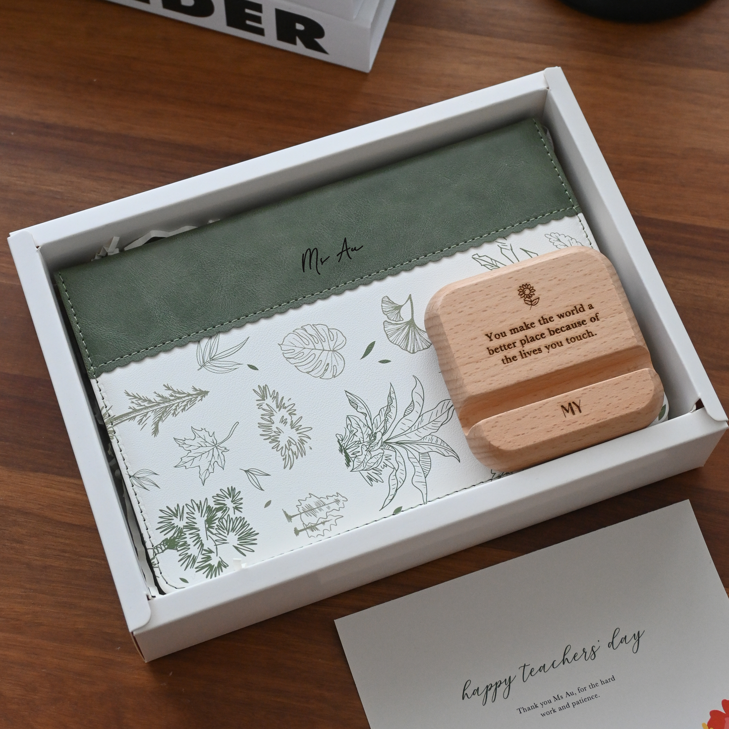 Gift set with wooden phone stand, card, and botanical design notebook for teachers' day singapore