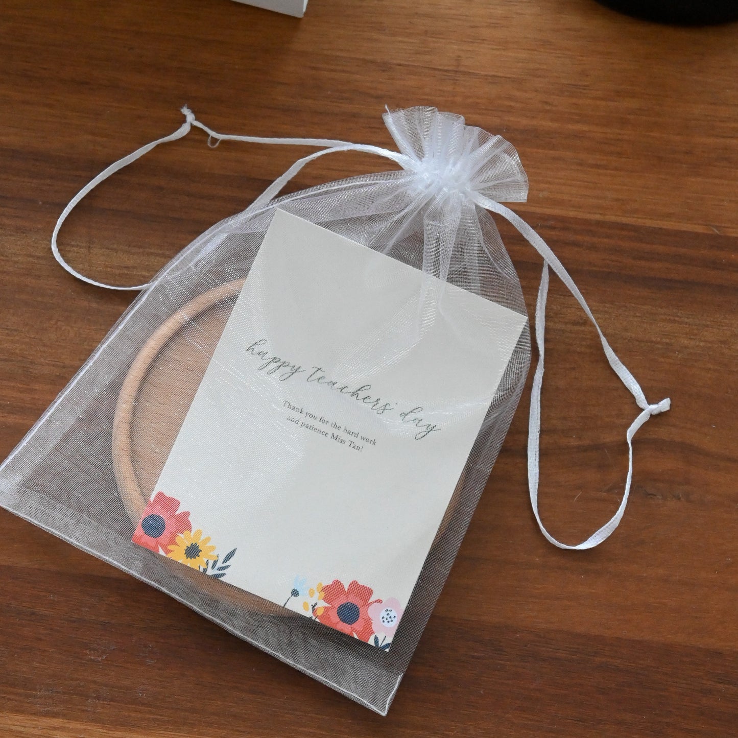 Wooden coaster with personalised engraved message, leather keychain, and card for teachers' day singapore