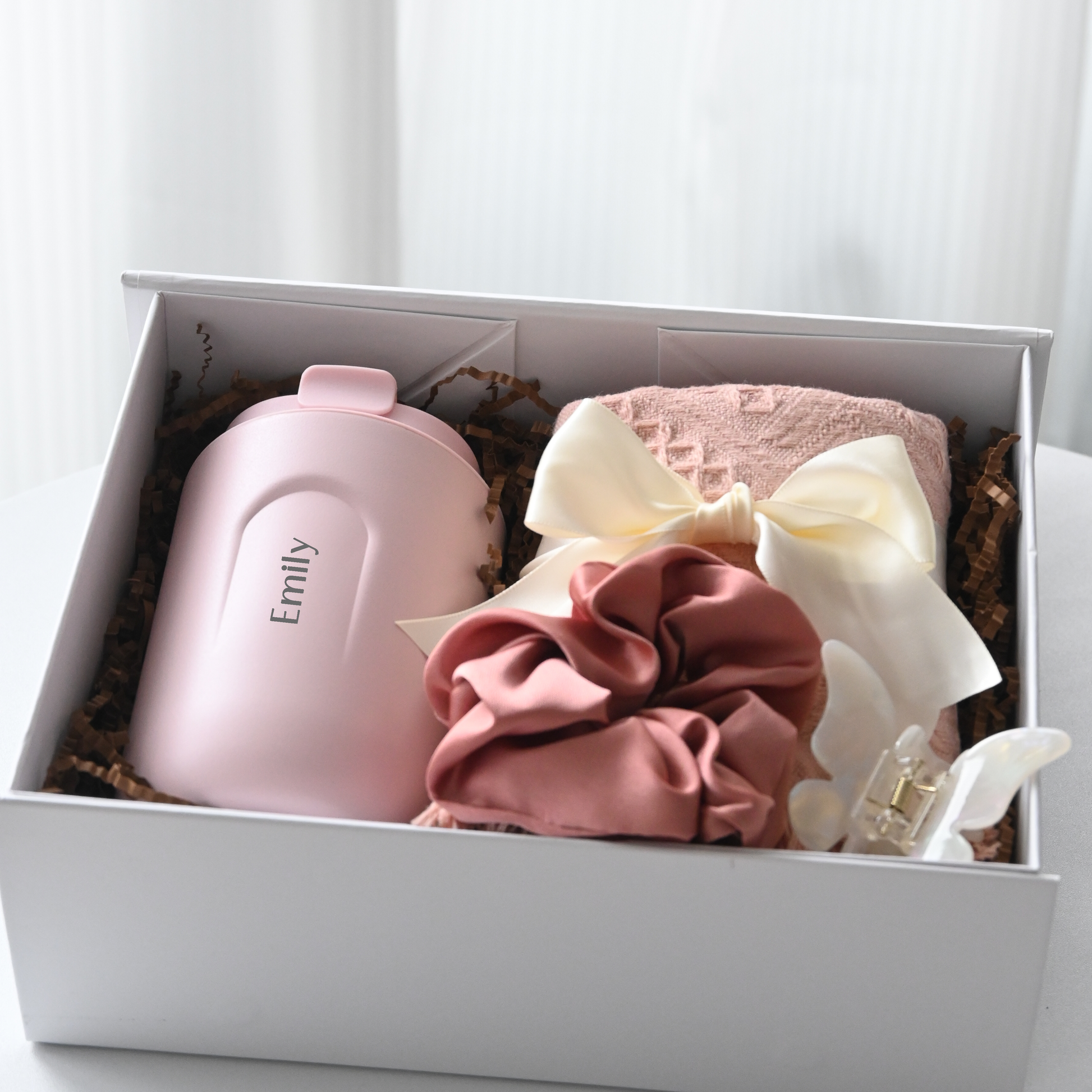 Personalised pink tumbler, pink tea towel, pink scrunchie and butterfly claw clip in a white gift box
