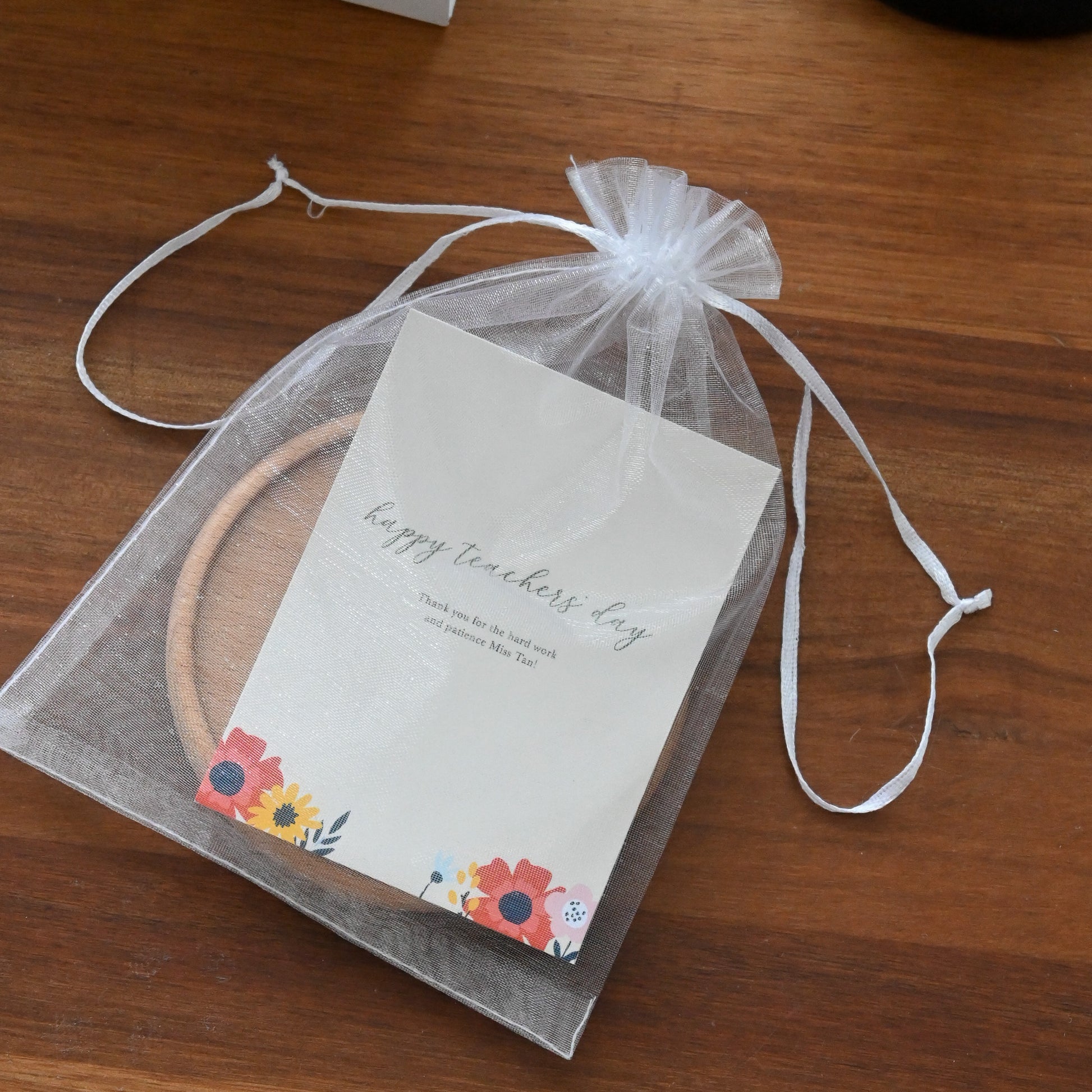 Wooden coaster with personalised engraved message, leather keychain, and card for teachers' day singapore