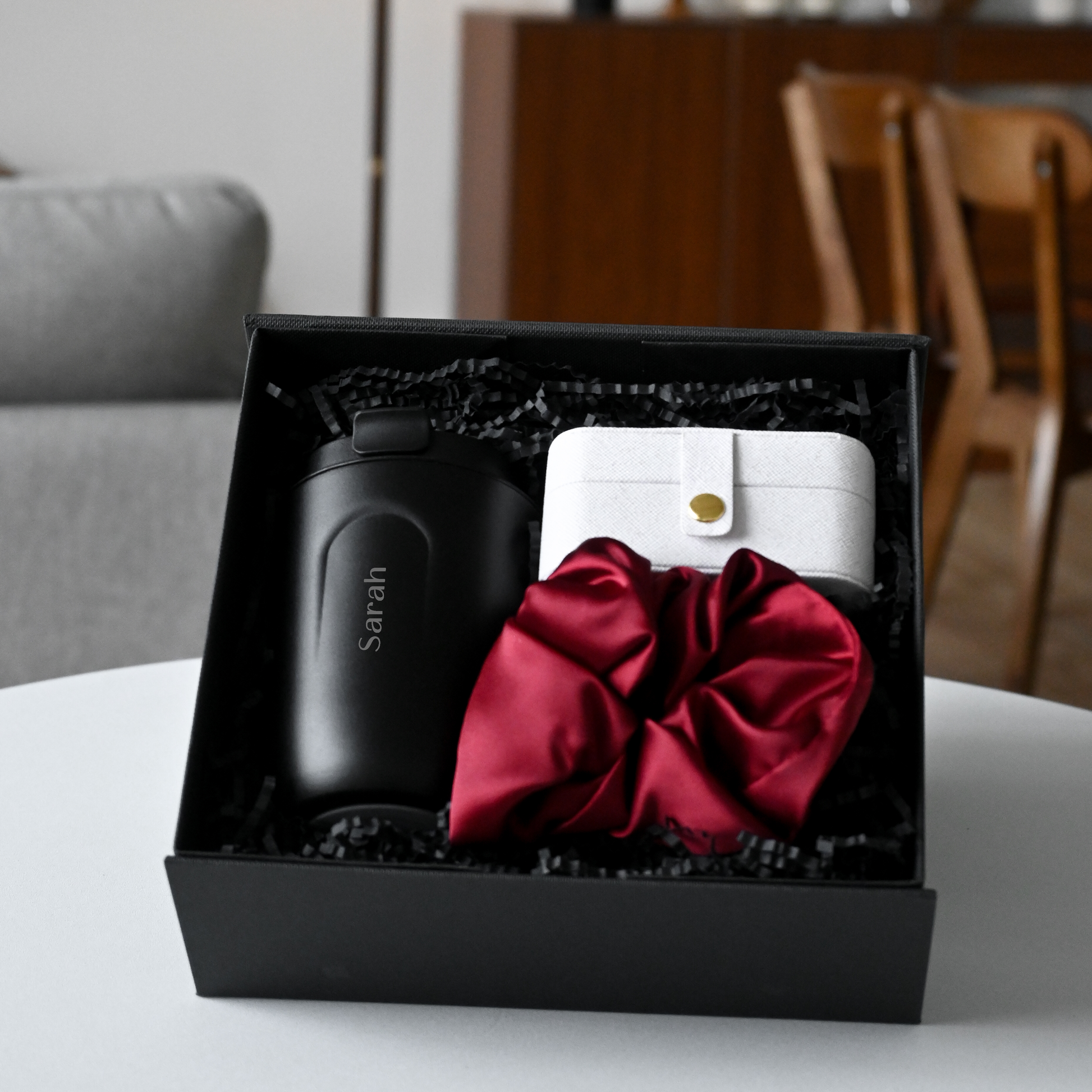 Personalised Black tumbler, white jewellery organiser, and red scrunchie in a black gift box 